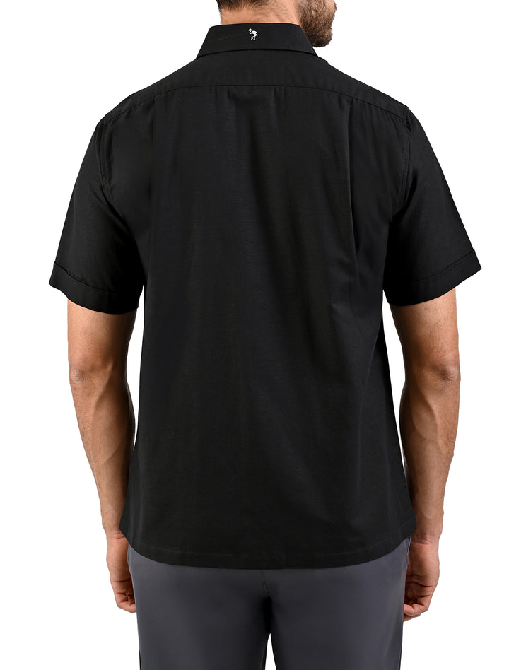 Vista trasera de guayamisa manga corta negra con bordado decorativo - Ropa Flamingo
