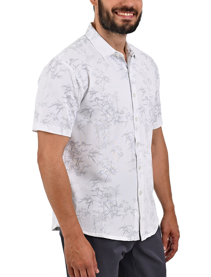 Vista lateral de camisa manga corta ultra suave relax blanca con estampado de bambú - Ropa Flamingo
